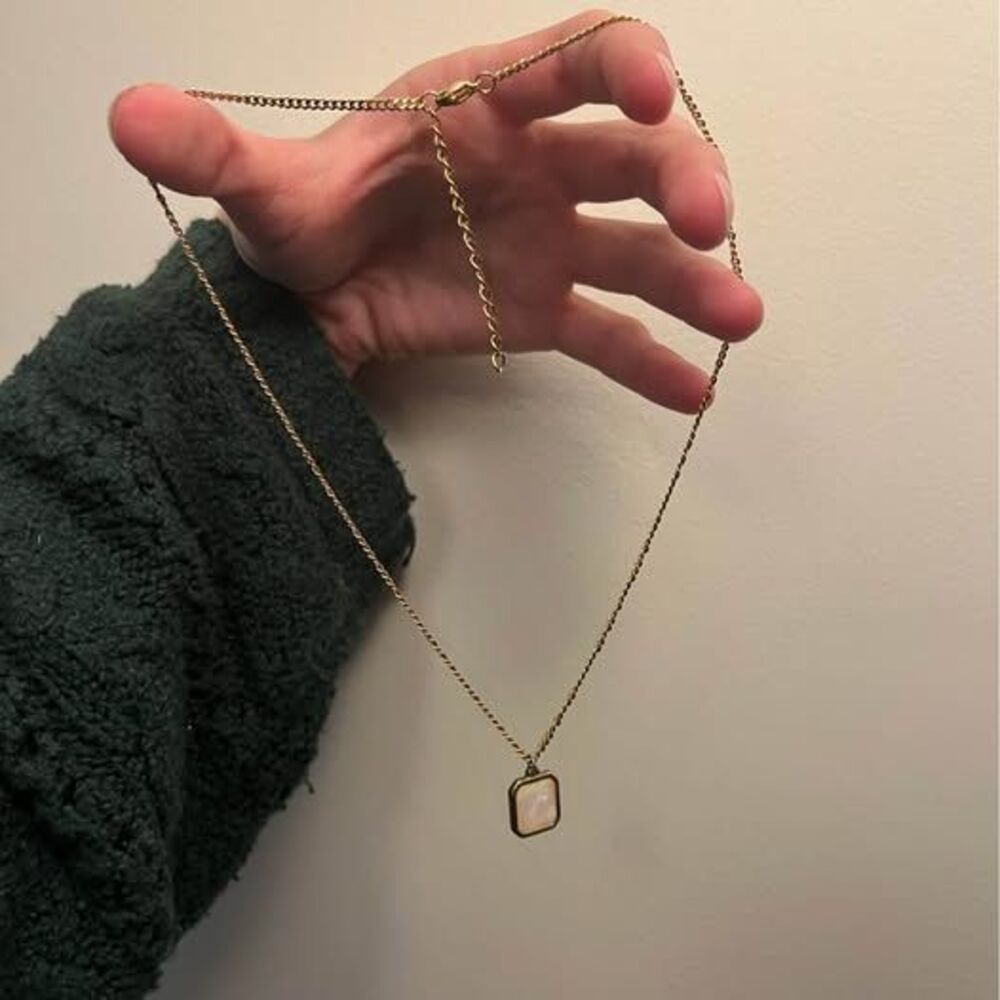 Gold chain necklace with square light inlay pendant